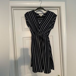 Navy and white causal dress. Comfortable. On the shorter side so selling it.